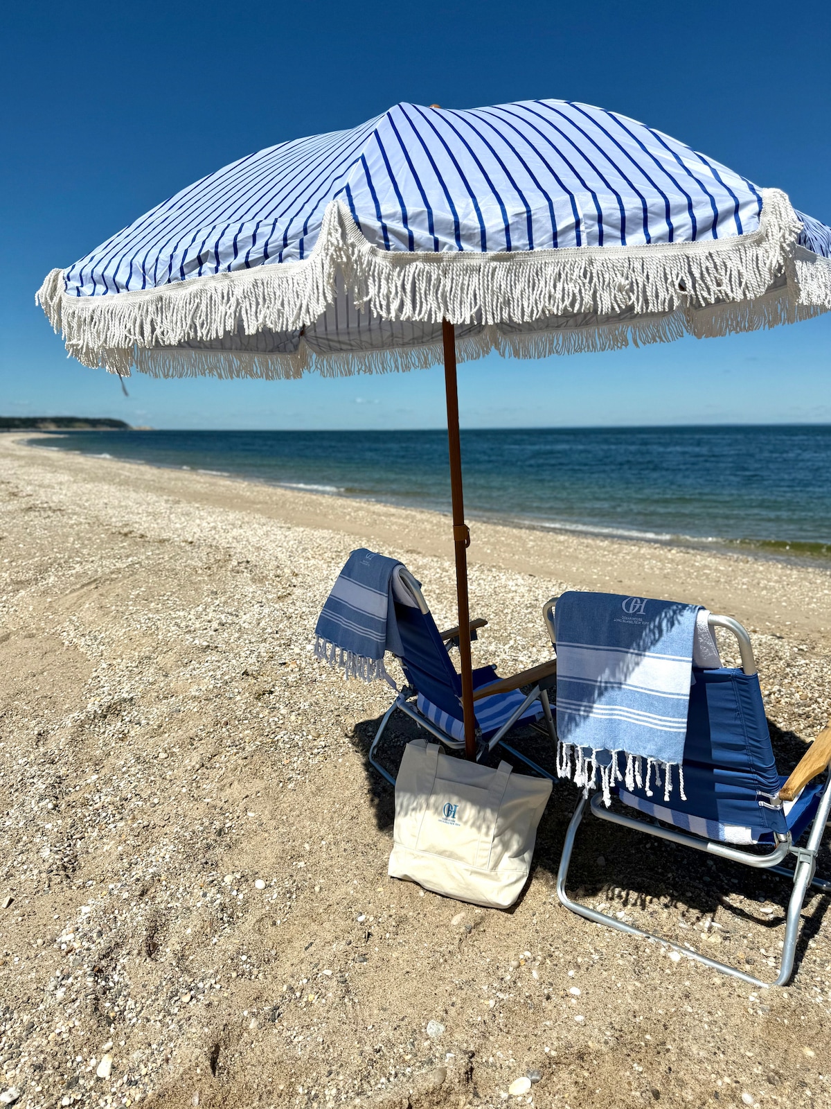 Private beach setup with lounge chairs at Ocean House
